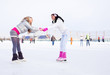 girls ice skating
