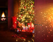 Photo: Christmas scene with tree and fire in background Christmas scene with tree and fire in background