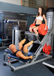 man and a woman in the gym