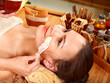 Young woman having clay facial mask. Young woman having clay facial mask.