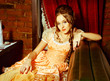 A girl in a ball gown.