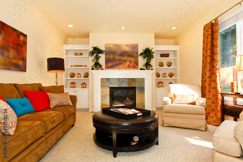 Photo: Cozy furnished living room with sofa and fireplace Cozy furnished living room with sofa and fireplace