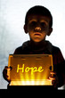 Child and box shine light