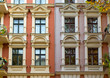 Windows of two rehabilitated town houses
