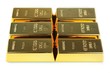 Gold bars on white background
