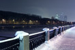 Quay of Moskva river and view of  Moscow City complex at night