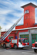 fire station, red fire truck with long ladder, red high tower