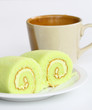 roll cake and a cup of coffee