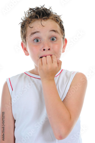 Photo: Portrait of a frightened boy Portrait of a frightened boy