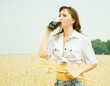 Girl  with kvass at  field