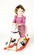 Photo: Toddler on Rocking Horse Toddler on Rocking Horse