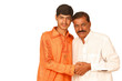 indian old man and teenager hug