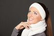 Side view of closeup of a girl in warm clothing