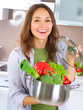 Beautiful Young Woman cooking fresh Vegetables Beautiful Young Woman cooking fresh Vegetables