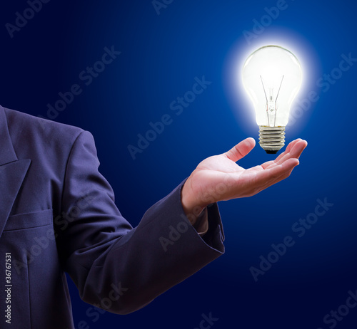 Photo: light bulb on hand light bulb on hand