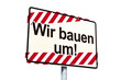 Ortseingangsschild mit Wir bauen um