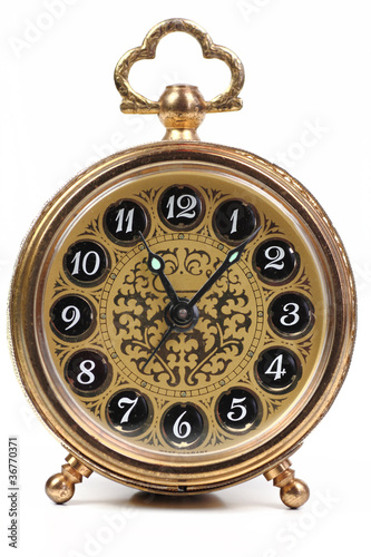 Foto: Alter verzierter Wecker / Taschenuhr Alter verzierter Wecker / Taschenuhr