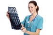 Young female doctor checking MR.