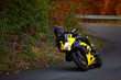 Photo: motorbike pilot coming out from curve motorbike pilot coming out from curve