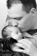 Happy Daddy Kissing His Baby Daughter