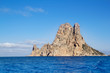 Es Vedra islet island in blue Mediterranean Es Vedra islet island in blue Mediterranean