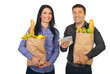 Happy couple shopping food with money