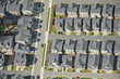 Single Car Driving Out of Housing Complex