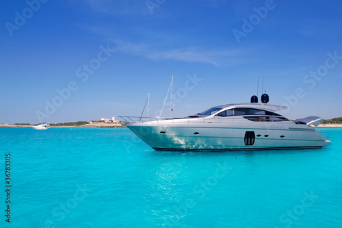 Photo: yatch in turquoise beach of Formentera yatch in turquoise beach of Formentera