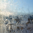 White crystals ice on winter window