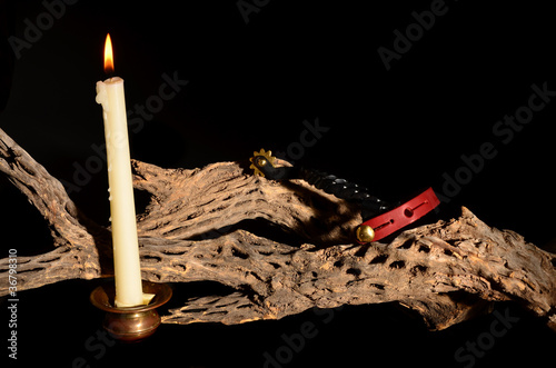 Photo: Candle and Spurs Candle and Spurs