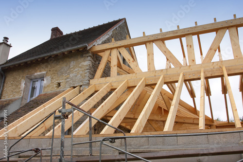 Photo: construction of the wooden frame of a roof, charpente en bois construction of the wooden frame of a roof, charpente en bois