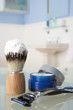 Man's shaving kit in bathroom