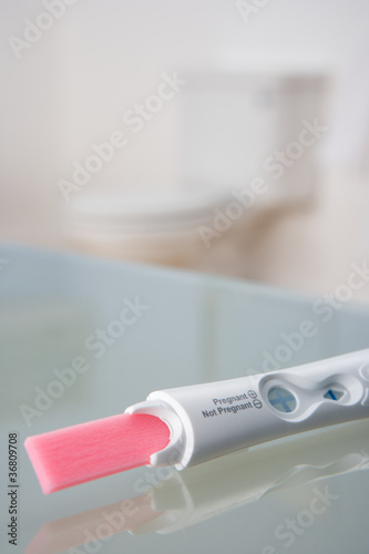 Photo: Pregnancy testing kit in bathroom Pregnancy testing kit in bathroom