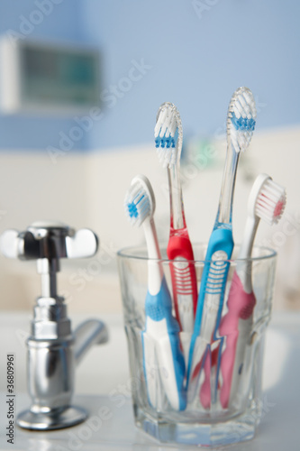 Photo: Toothbrushes in bathroom Toothbrushes in bathroom