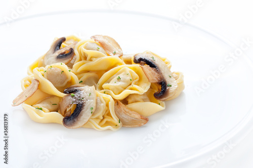 Photo: Tortellini dish with mushrooms and garlic sauteed Tortellini dish with mushrooms and garlic sauteed