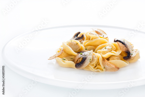 Photo: Tortellini dish with mushrooms and garlic sauteed Tortellini dish with mushrooms and garlic sauteed