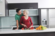 young couple have fun in modern kitchen
