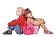 Foto: Brother and sister sitting back to back Brother and sister sitting back to back