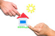 male and female hands building toy house male and female hands building toy house