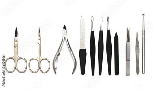 Photo: Manicure or pedicure equipment on white Manicure or pedicure equipment on white