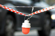 Protecting road tape and red signal