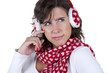 Photo: young brunete woman holding christmas themed scarf isolated on w young brunete woman holding christmas themed scarf isolated on w
