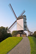Photo: Wind mill and path at afternoon at Brugge - Belgium Wind mill and path at afternoon at Brugge - Belgium