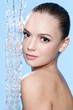 Beautiful woman and stream of water
