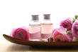 Photo: health spa setting with bottle of lavender massage oil health spa setting with bottle of lavender massage oil