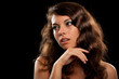 Beautiful young lady on black