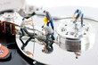 Group of workers repair hard drive