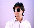 yong indian male model wearing glasses