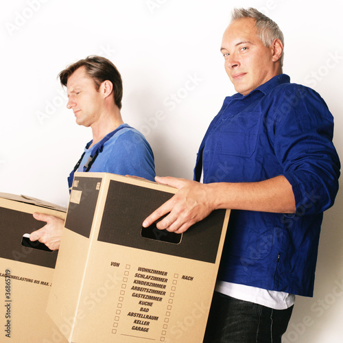 Photo: Umzugshelfer bei der Arbeit Umzugshelfer bei der Arbeit