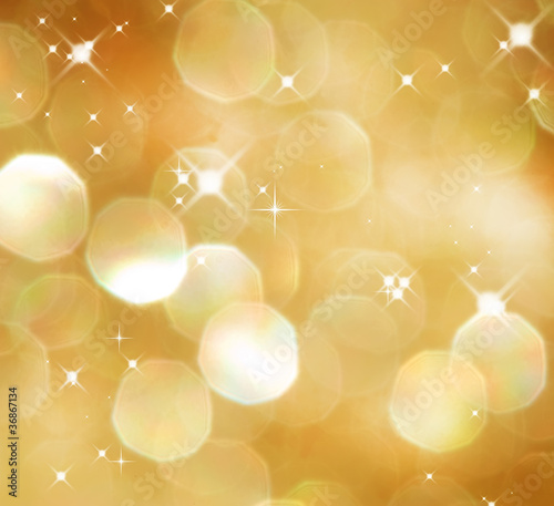 Photo: Christmas Glittering background. Holiday Gold abstract texture Christmas Glittering background. Holiday Gold abstract texture